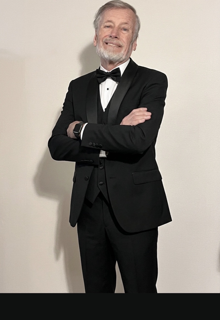 Troy Milligan in a tuxedo
